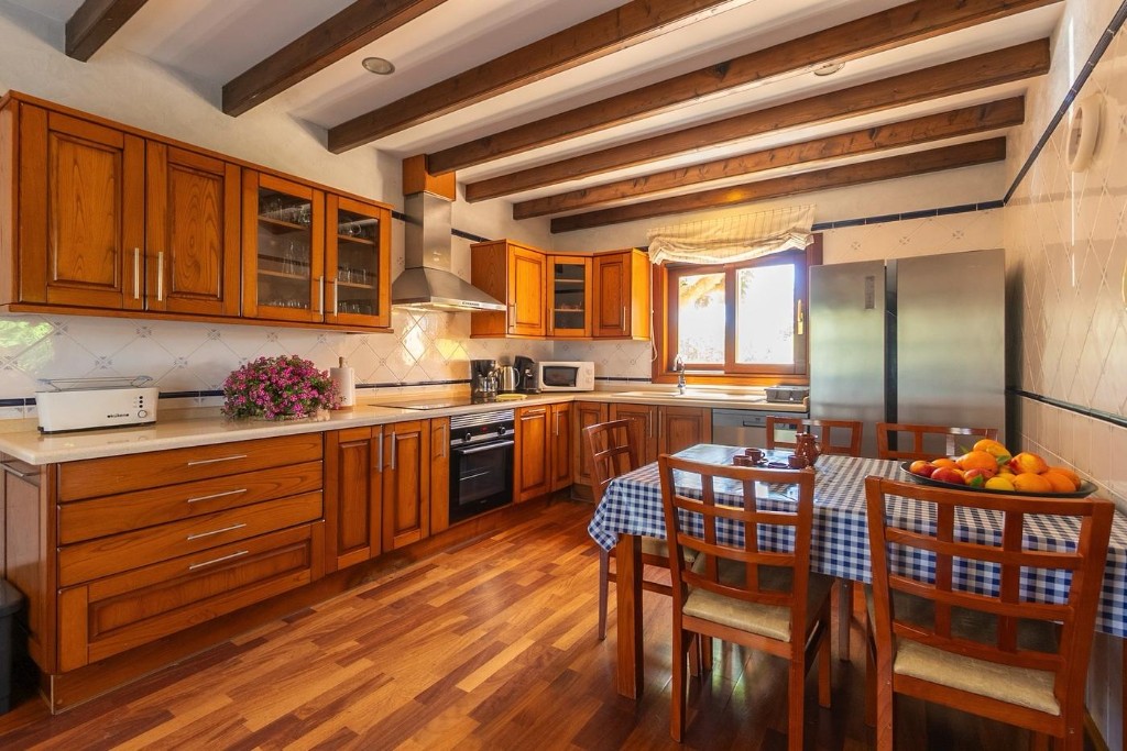 Large, welcoming kitchen with a dining table